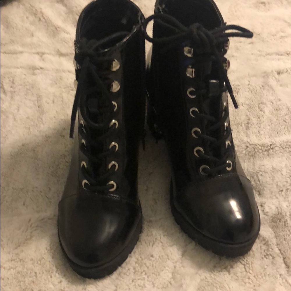 Black lace up shiny leather shoes